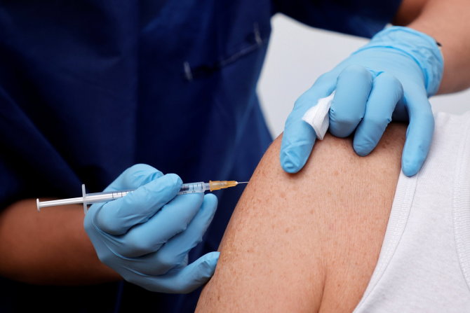 „Reuters“/„Scanpix“ nuotr./Vakcina nuo COVID-19