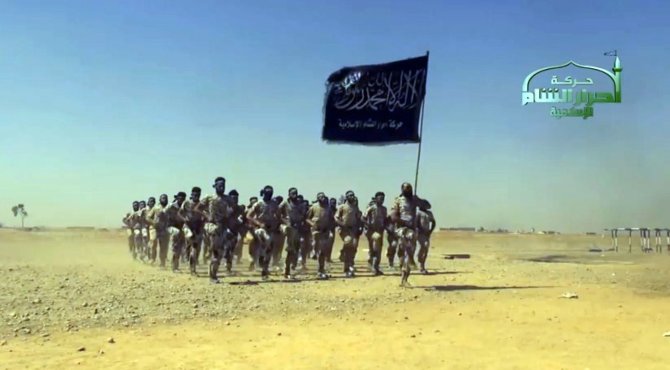 AFP/„Scanpix“ nuotr./Stop kadras iš „IS“ propagandinio vaizdo įrašo