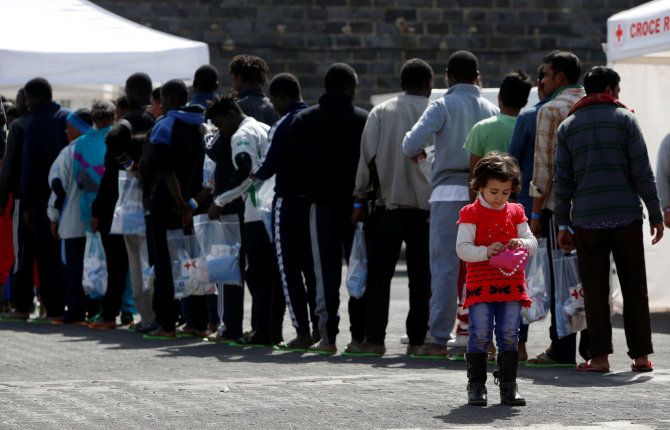„Reuters“/„Scanpix“ nuotr./Migrantai Italijoje