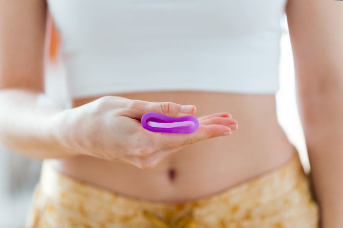 123RF.com nuotr./Moteris su menstruacine taurele
