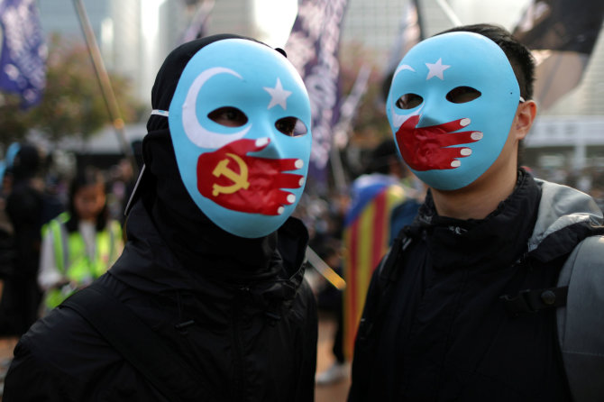„Reuters“/„Scanpix“ nuotr./Uigūrų palaikymo akcija Honkonge