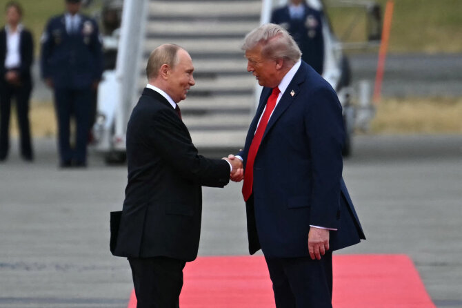Scanpix nuotr./Putinas ir Trumpas susitiko Aliaskoje