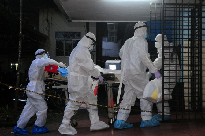 Reuters/Scanpix nuotr. / Nipos virusas Indijoje