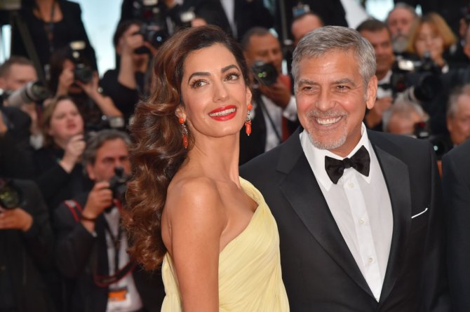 AFP/„Scanpix“ nuotr./George'as Clooney su žmona Amal Clooney