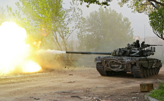 „Reuters“/„Scanpix“ nuotr./Rusijos tankas Ukrainoje