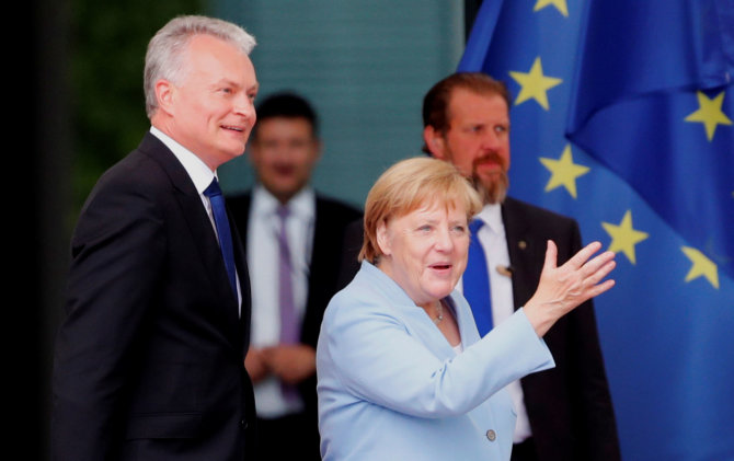 AFP/„Scanpix“ nuotr./G.Nausėda ir A.Merkel