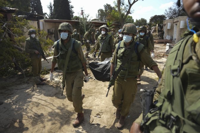 „Scanpix“/AP nuotr./„Hamas“ žudynių vaizdai Kfar Azza kibuce Izraelyje