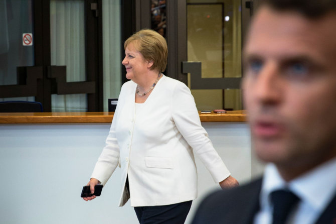 AFP/„Scanpix“ nuotr./Angela Merkel, Emmanuelis Macronas