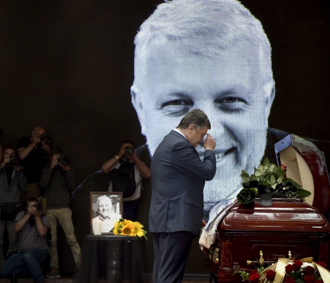 AFP/„Scanpix“ nuotr./Žurnalisto Pavelo Šeremeto laidotuvės