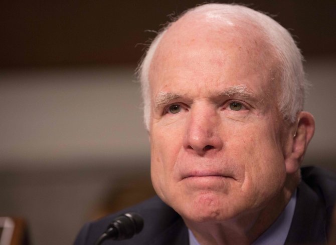 AFP/„Scanpix“ nuotr./Johnas McCainas