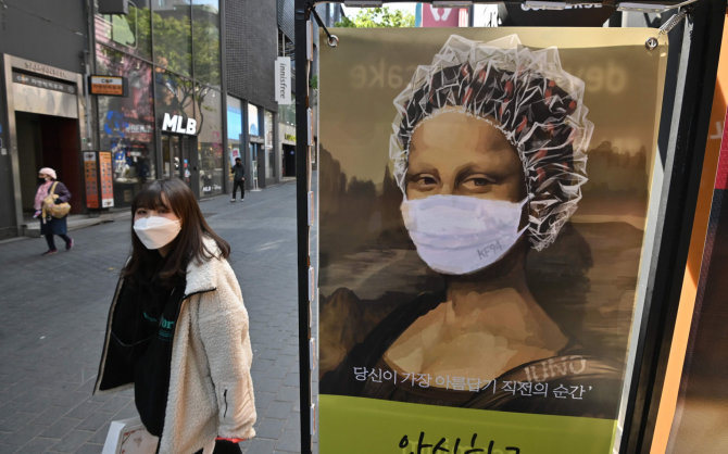 AFP/„Scanpix“ nuotr./Gyvenimas Pietų Korėjoje koronaviruso pandemijos metu