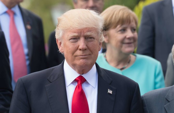 „Scanpix“/„SIPA“ nuotr./Donaldas Trumpas ir Angela Merkel