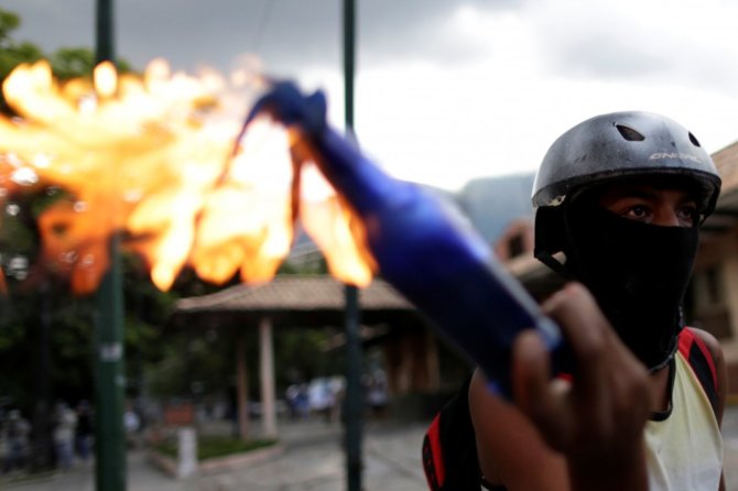 „Reuters“/„Scanpix“ nuotr./Protestas Venesueloje