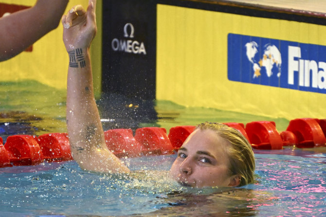 „Scanpix“/AP nuotr./Pasaulio čempionate Melburne Rūta Meilutytė pagerino pasaulio rekordą 50 m krūtine rungties pusfinalyje.