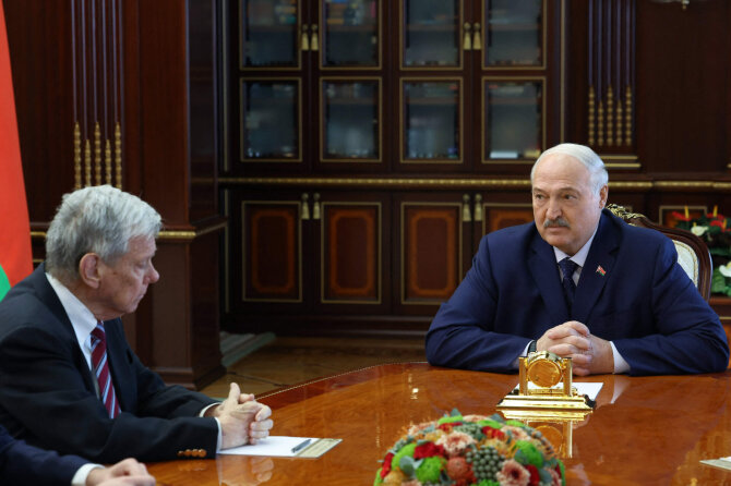 J. Coale'as susitiko su A. Lukašenka / HANDOUT / AFP