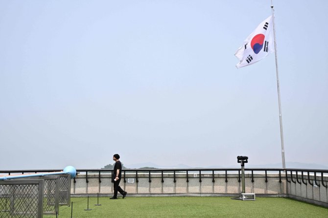 AFP/„Scanpix“ nuotr./Pietų Korėjos vėliava