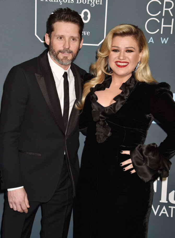Kelly Clarkson ir Brandonas Blackstockas/SCANPIX nuotr.