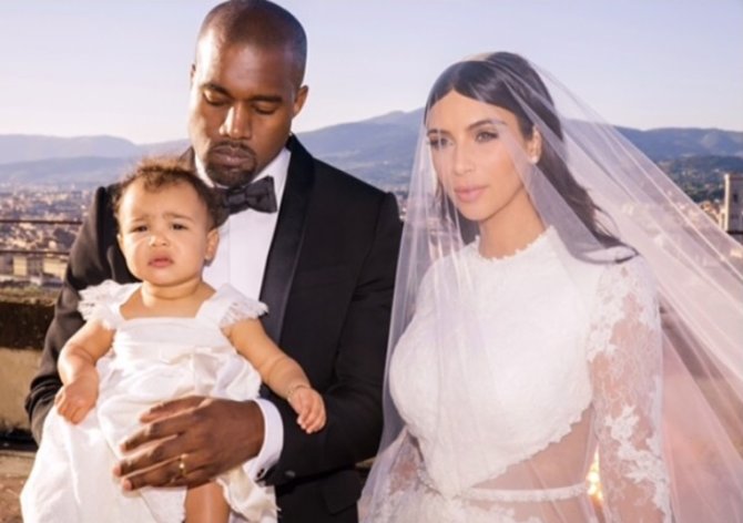 „Instagram“ nuotr./Kim Kardashian ir Kanye Westas su dukra North