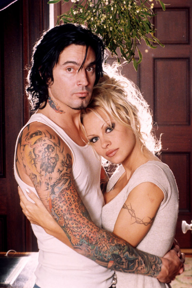 Vida Press nuotr./Pamela Anderson su pirmuoju vyru Tommy Lee (1995 m.)