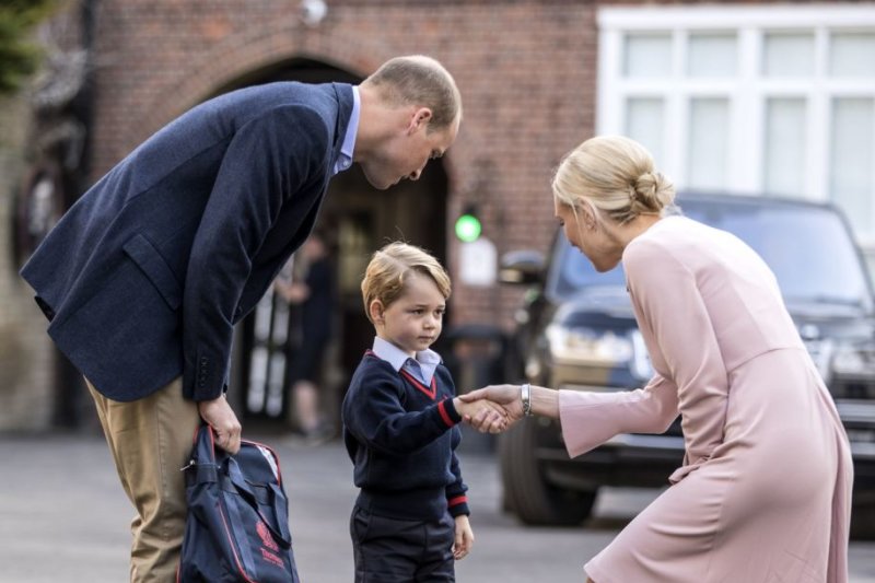 Princas Williamas su sūnumi princu George'u ir pradinių klasių departamento vadove Helen Haslem