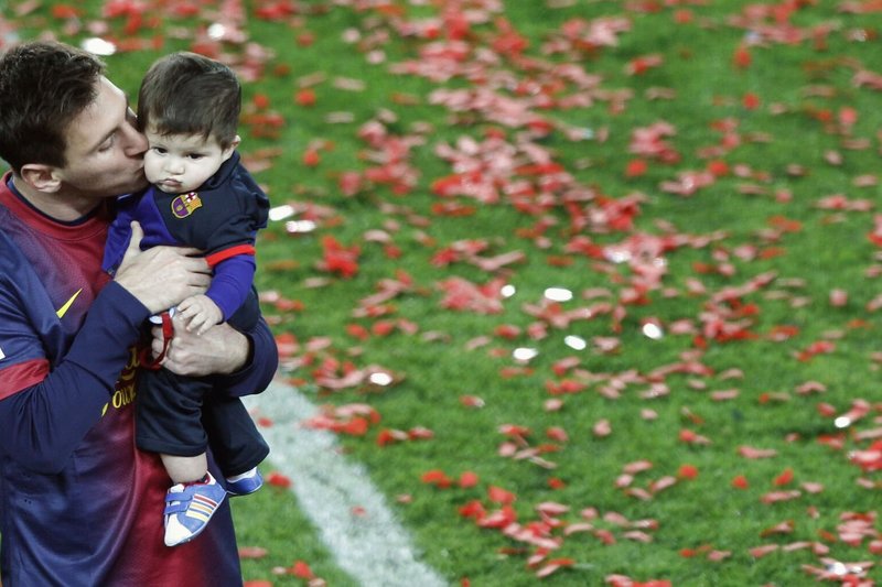 Lionelis Messi su sūnumi Thiago