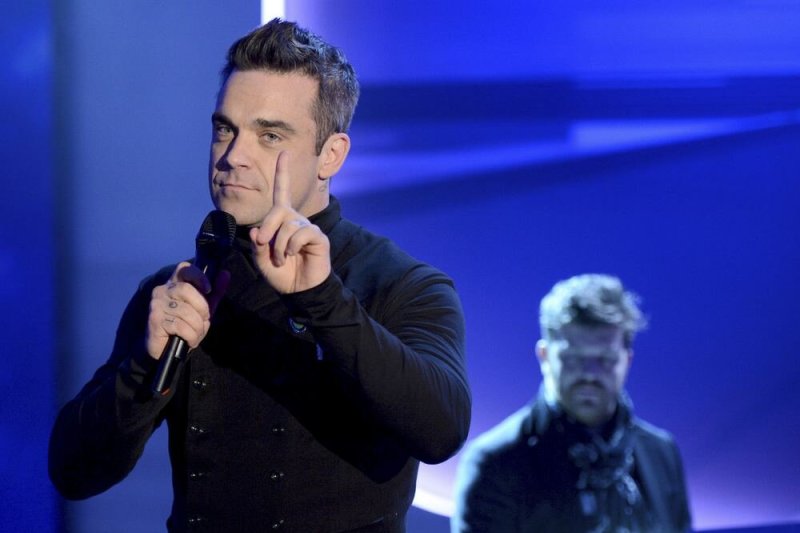 Robbie Williamsas paskelbė konkursą, kurio nugalėtojais tapę 10 gerbėjų galės atvykti į koncertą Estijoje bei asmeniškai su juo susitikti