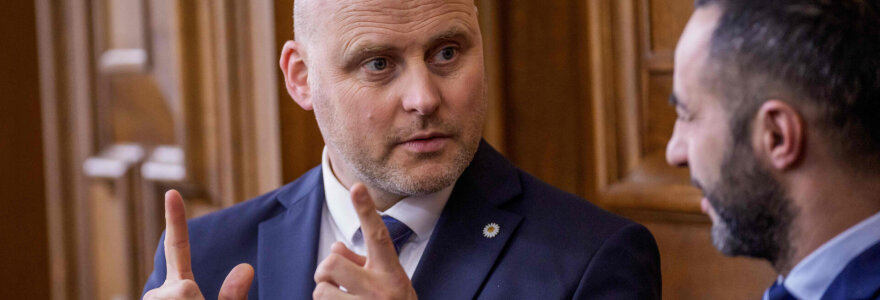 Andris Kulbergas / GINTS IVUSKANS / AFP