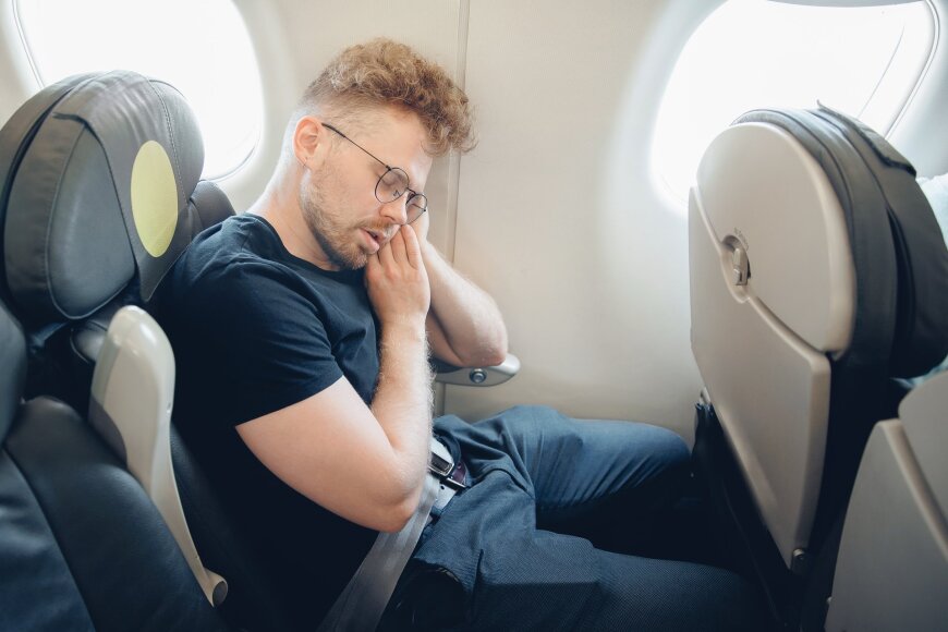Shutterstock nuotr. / Miegas lėktuve