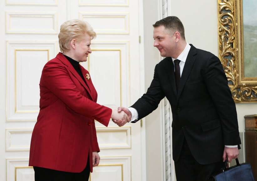 Šarūnas Mažeika / BNS nuotr./Dalia Grybauskaitė ir Eligijus Masiulis 2010 m.