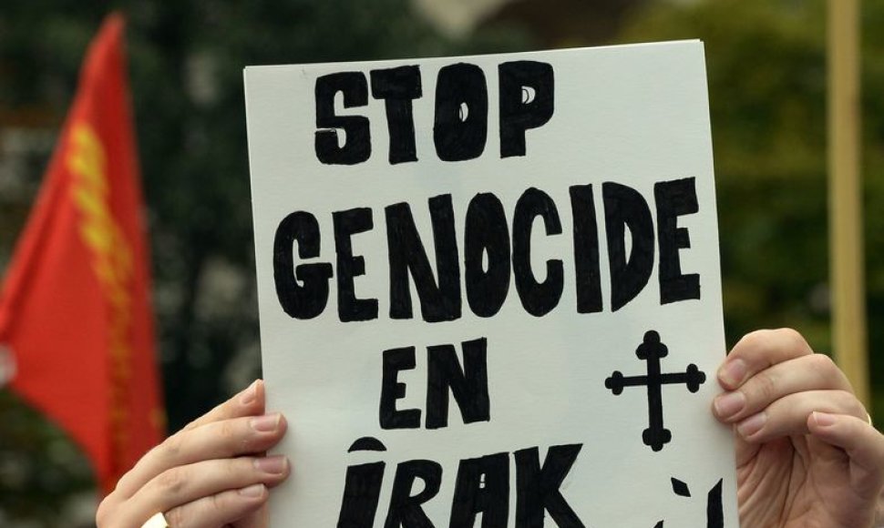 Protesto prieš krikščionių žudymą Irake ir Sirijoje dalyvis