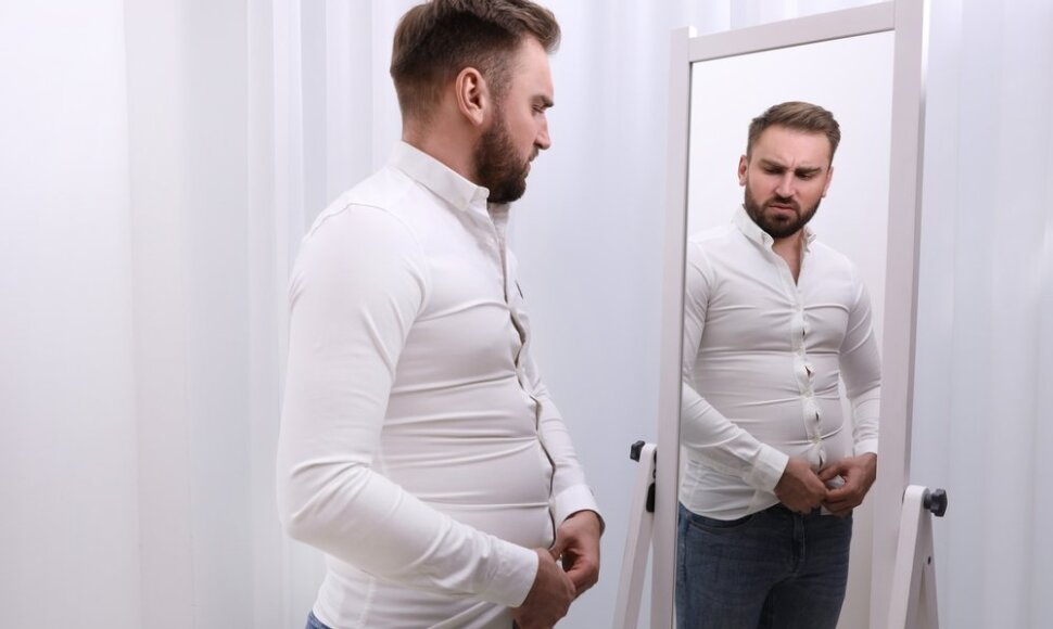 Vyrai į didėjantį svorį reaguoja kitaip nei moterys