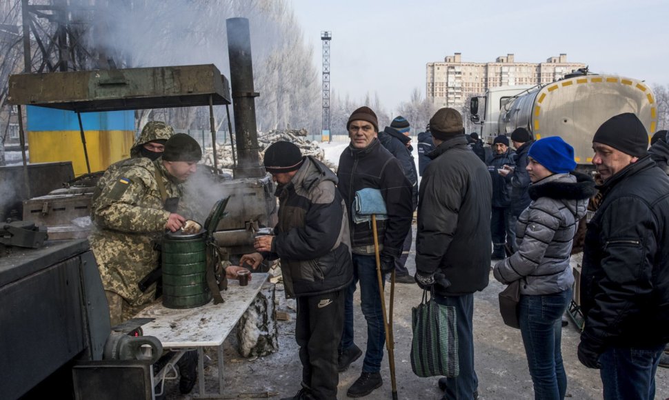 Rytų Ukrainoje nesiliaujant susirėmimams Kijevas prašo pagalbos kovoje su Rusija