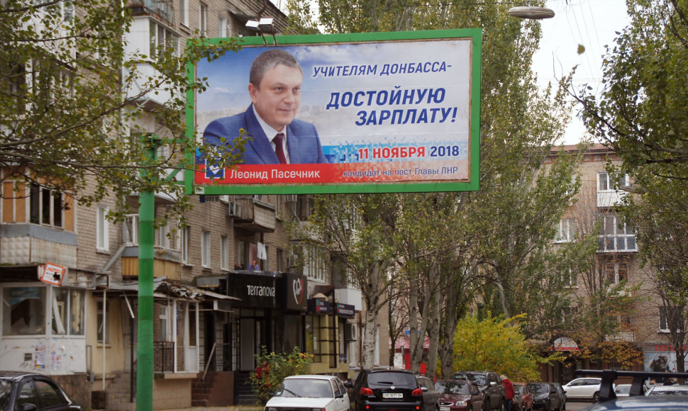 Plakatas, raginantis balsuoti už Leonidą Pasečniką
