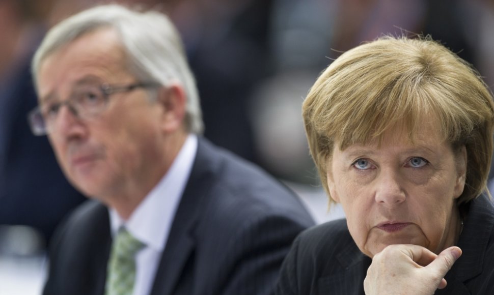 Jeanas-Claudeas Junckeris ir Angela Merkel