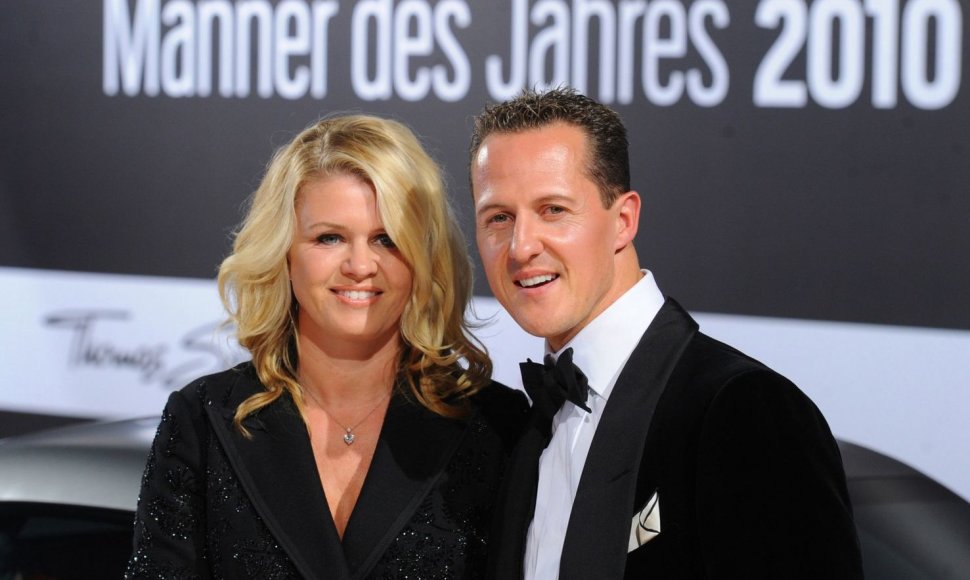 Michaelis Schumacheris su žmona Corinna 2010-ųjų spalį