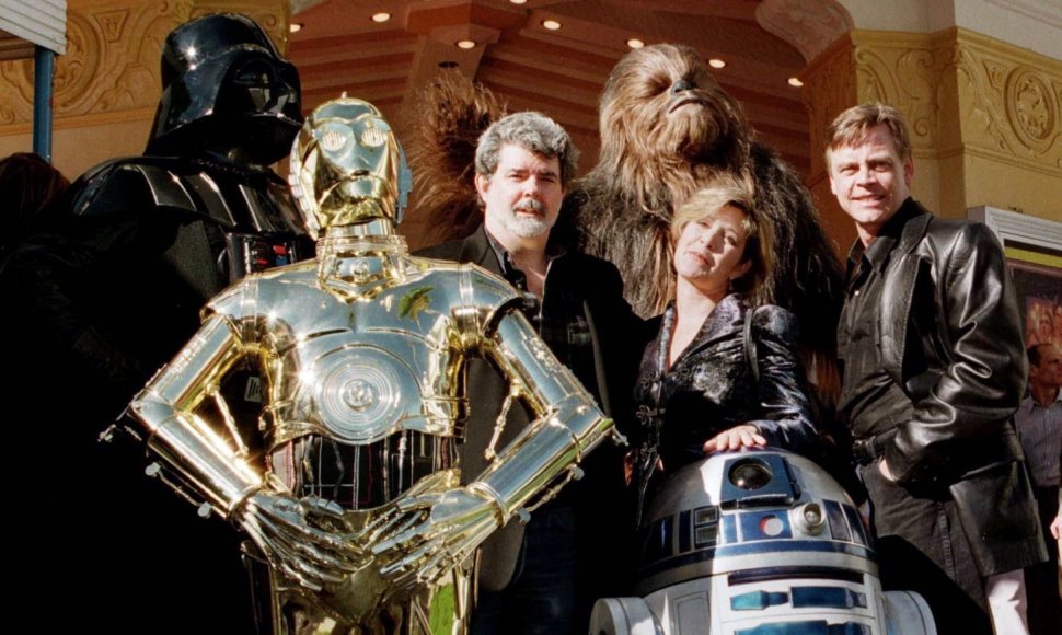 „Žvaigždžių karų“ kūrėjas George'as Lucasas su filmo aktoriais Carrie Fisher ir Marku Hamillu 1997-aisiais