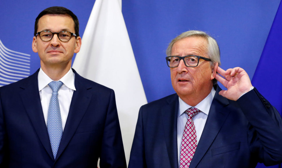 Mateuszas Morawieckis ir Jeanas-Claude'as Junckeris