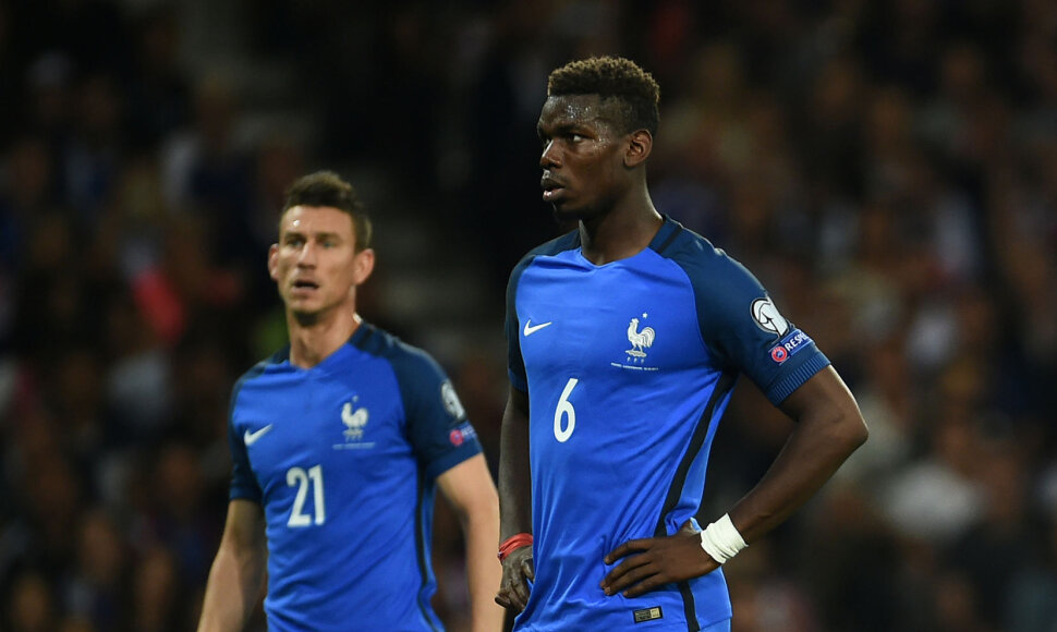 Paulis Pogba ir Laurent'as Koscielny 