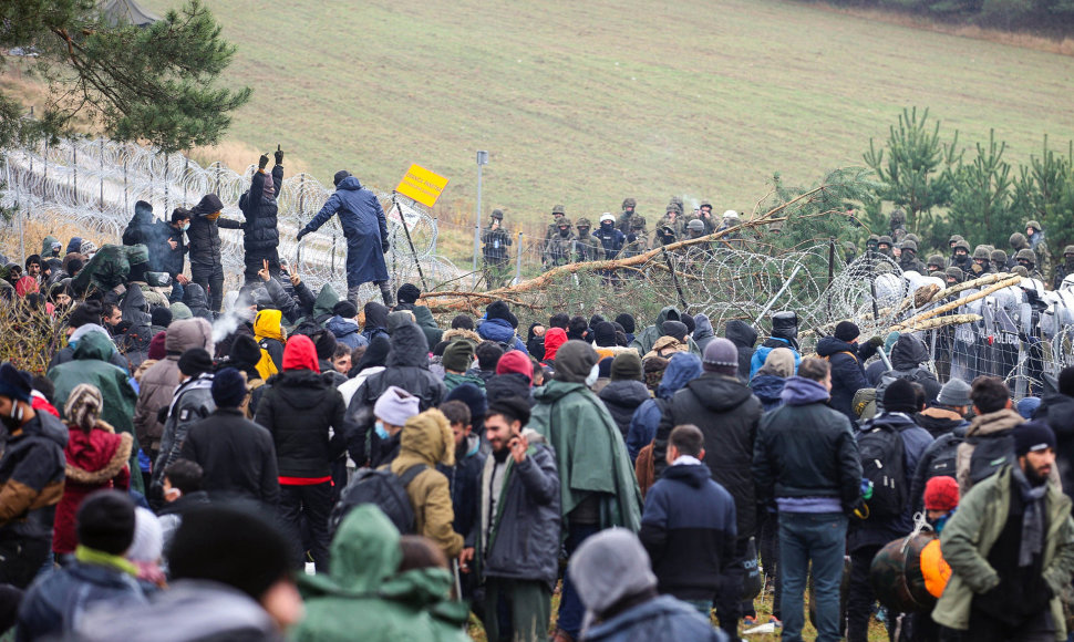 Migrantai Lenkijos pasienyje