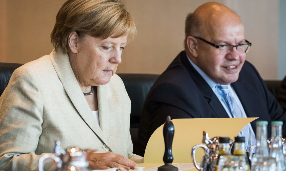 Angela Merkel ir Peteris Altmaieris