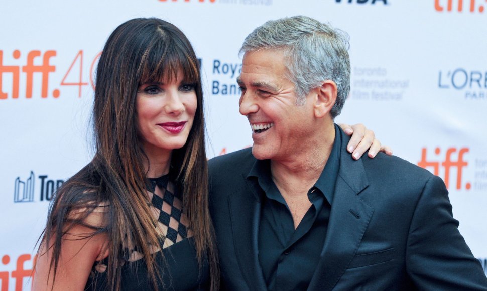 Sandra Bullock ir George'as Clooney