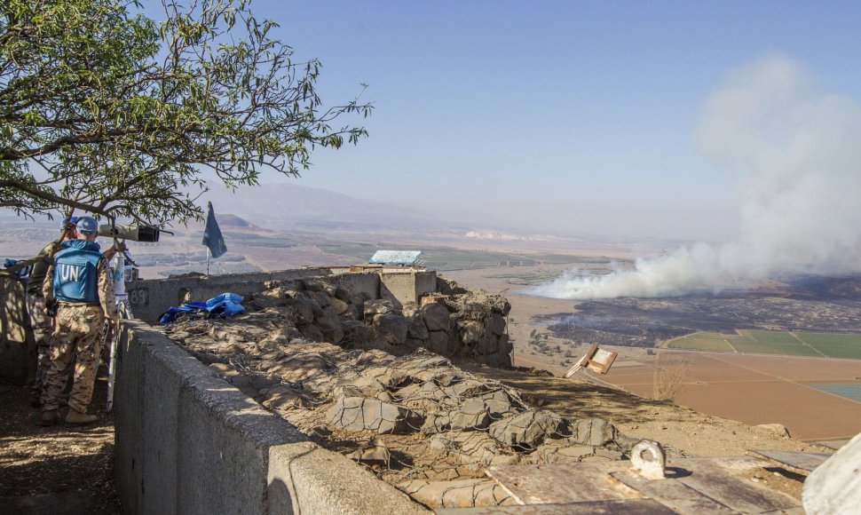 Žmonės Golano aukštumose stebi karą Sirijoje