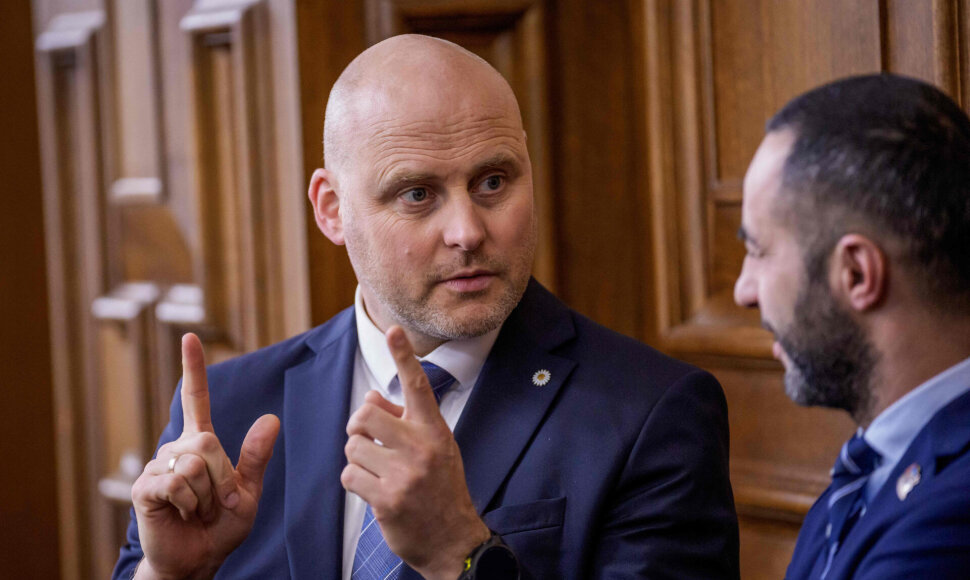 Andris Kulbergas / GINTS IVUSKANS / AFP