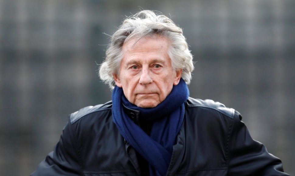 Režisierius Roman Polanski lanko ceremoniją Paryžiuje. / CHARLES PLATIAU / REUTERS