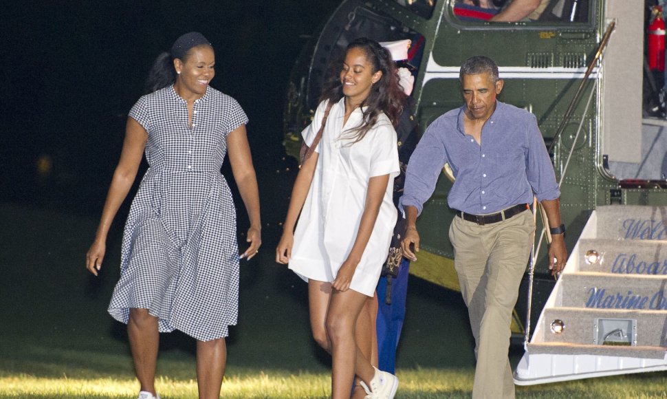 Barackas ir Michelle Obamos su dukra Malia