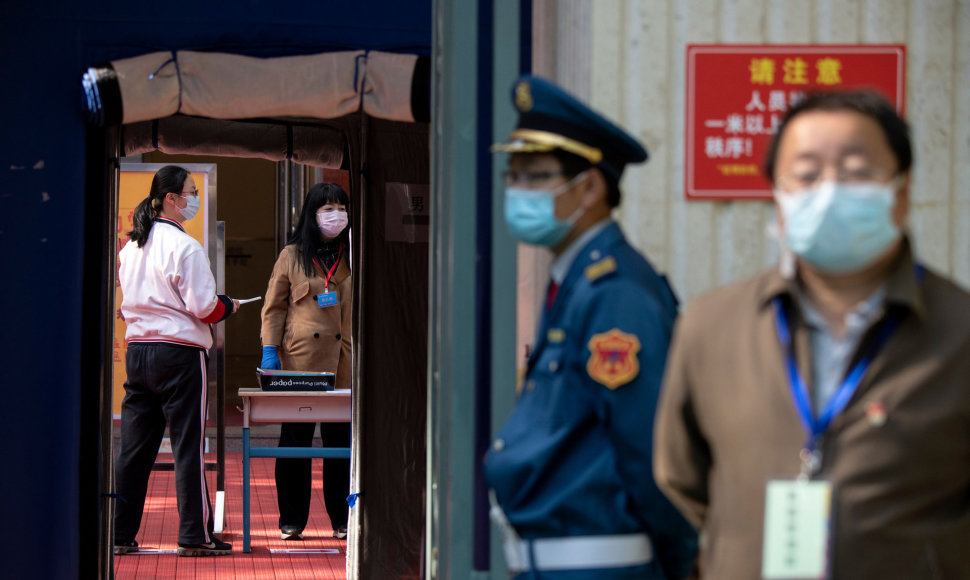 Kinijoje auga nerimas dėl naujų užsikrėtimų koronavirusu