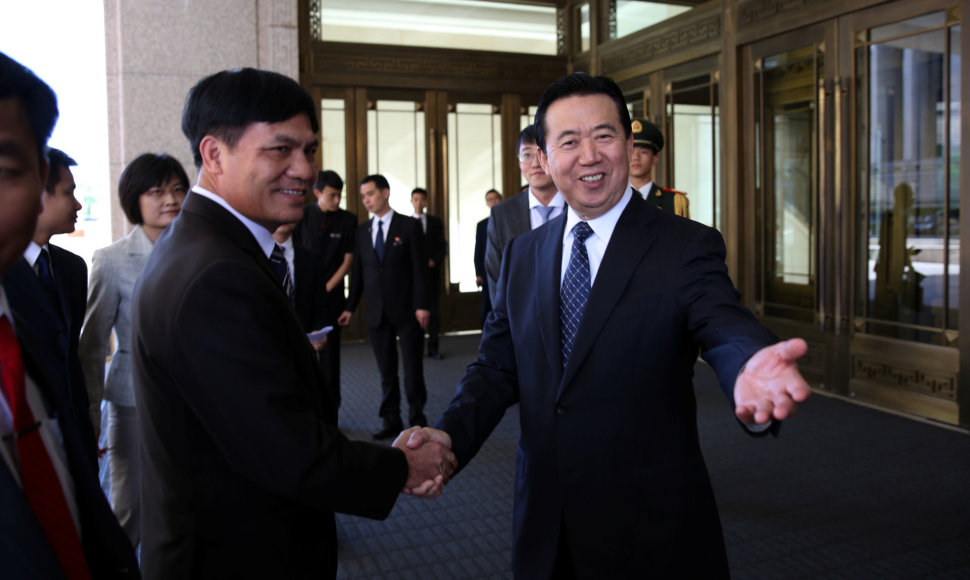 Interpolui vadovaus kinas Meng Hongwei (dešinėje)