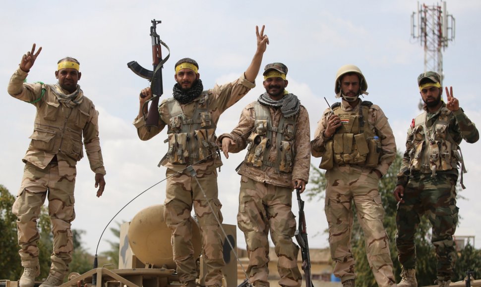 Irako pajėgos švenčia pergalę Tikrite.