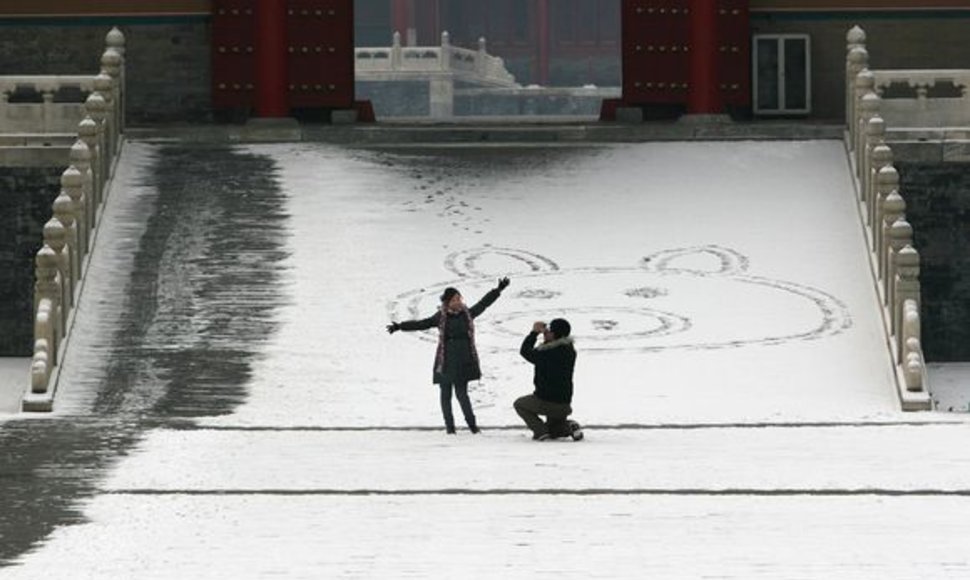 Sniegas į Kiniją atnešė džiaugsmo.