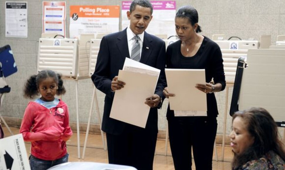 Barackas Obama su žmona ir dukra